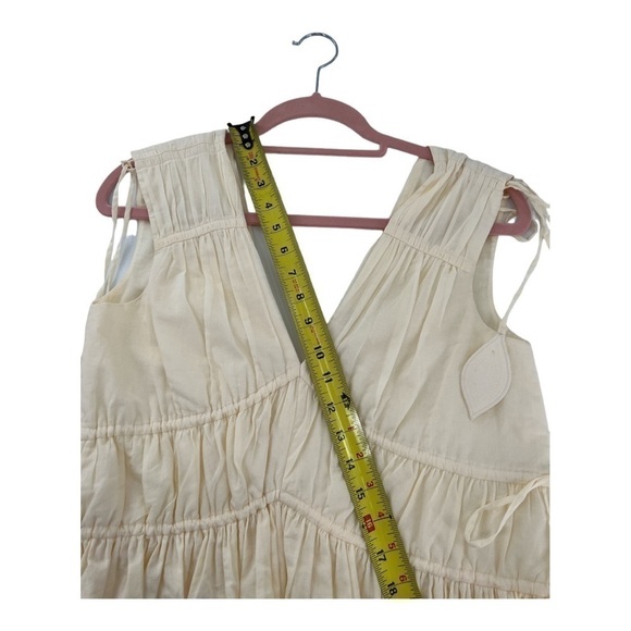 Tory Burch
Sleeveless Smocked Peplum Top COLOR New Ivory size 0 - Picture 14 of 17